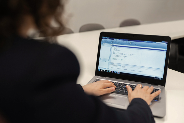 Professional shot of woman working on laptop