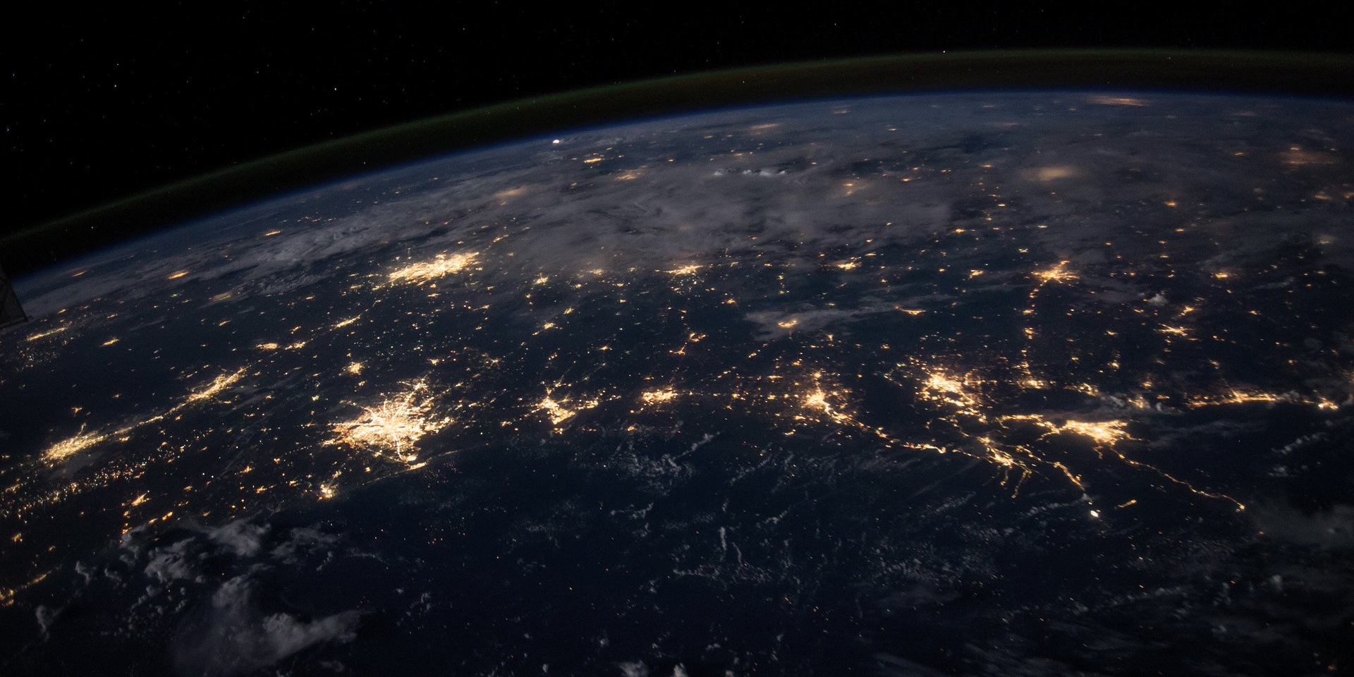 Earth at night with lights from space