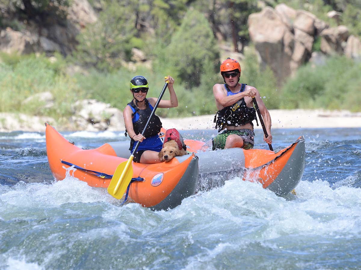 Nikki, Ryan and Cooper in raft on Arkansas River