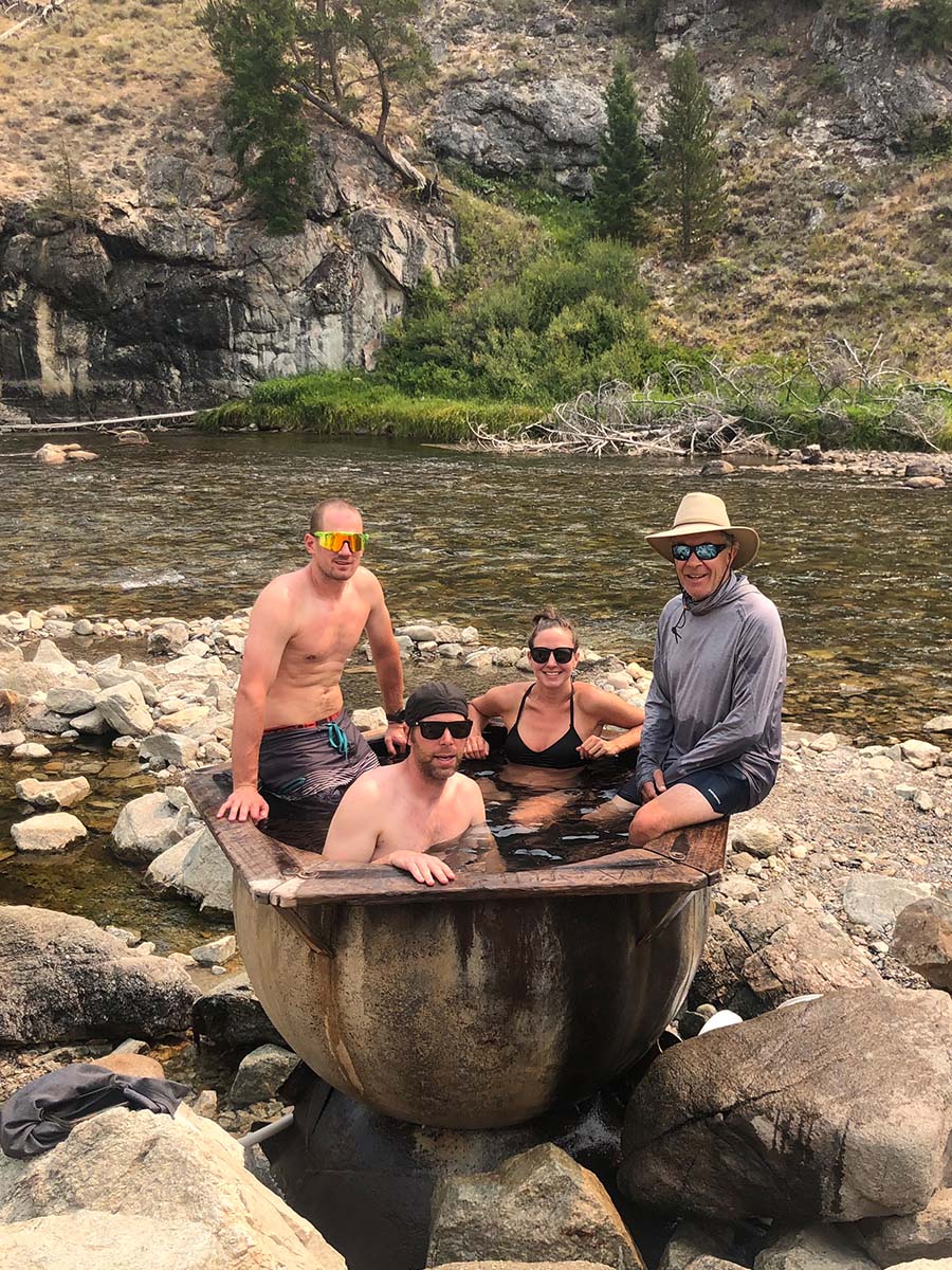 Family soaking in Boat Box Hot Springs