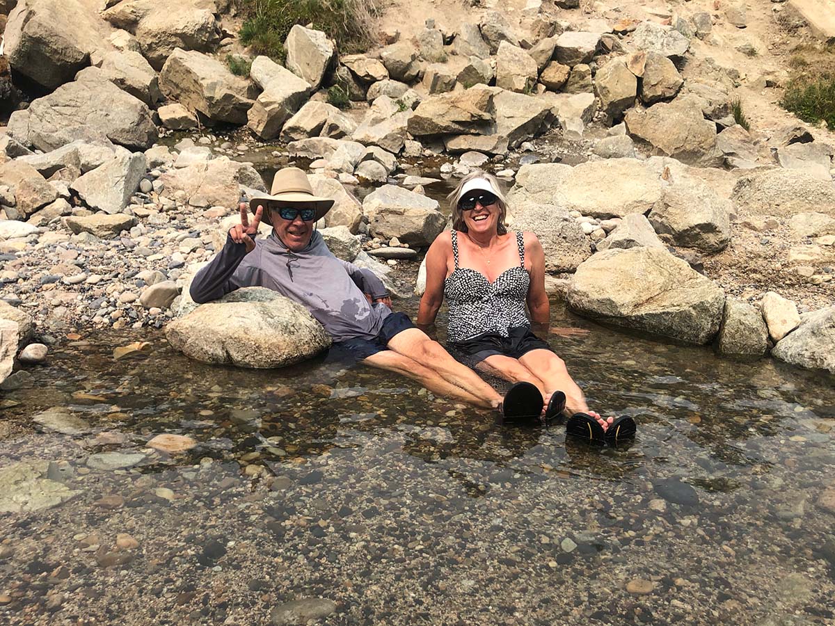 Scott and Maggie soaking in hot springs water