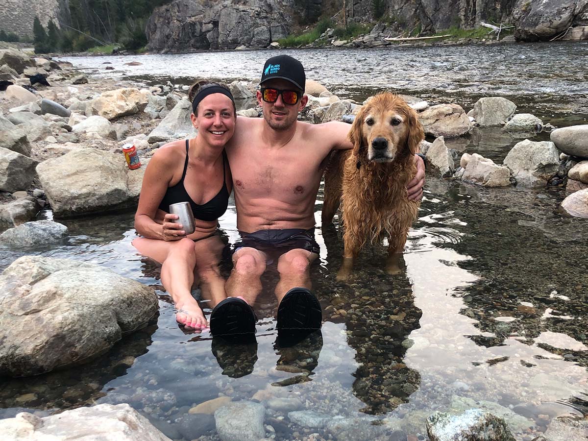 Nikki, Ryan and Cooper soaking in hot springs water